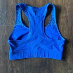 fabletics on the go medium impact royal blue racerback sports bra women’s small